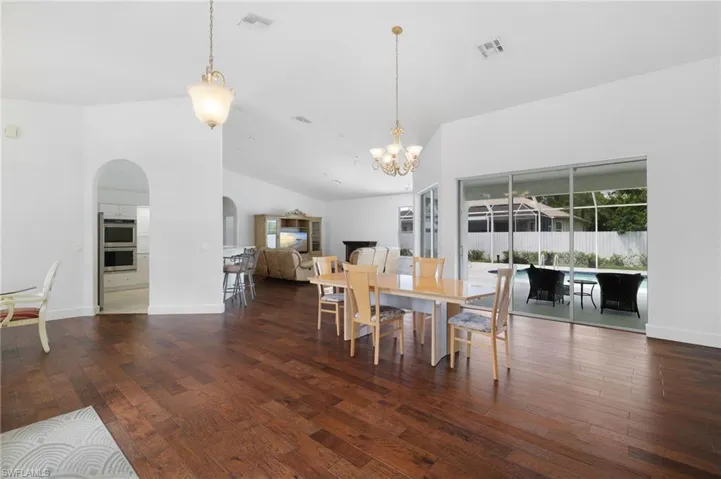 Hardwood flooring throughout main living area.