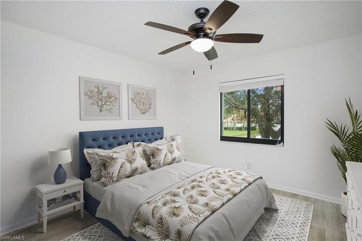 Primary bedroom with walk in closet and bathroom