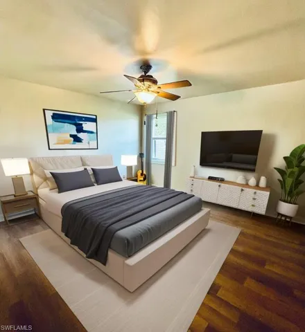 Virtually staged master bedroom w/new floors 14' x 14'5"