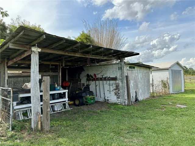 20x36 multipurpose shed w/electric & water. Fenced chicken coop yard. 30 amp RV hookup
