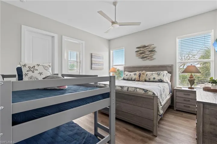 3rd Bedroom featuring laminated finished floors and ceiling fan