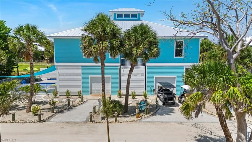 Island home built on cement pilings in the Key-West-Style