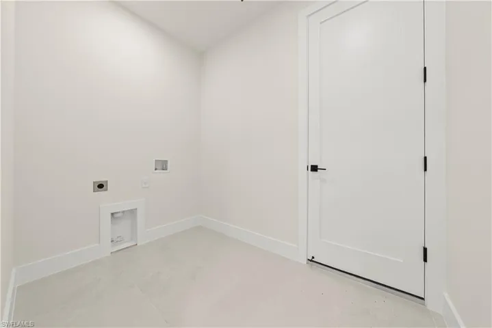 Laundry area with hookup for a washing machine and electric dryer hookup
