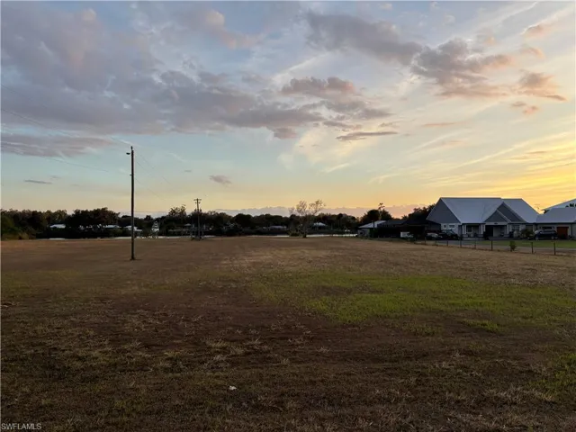 View of yard at dusk