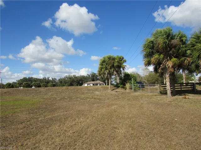 View from behind the berm to the gate.