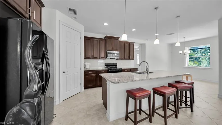 Gourmet Kitchen with Granite counters Huge Walk in Pantry and Informal Dining off Master Bedroom