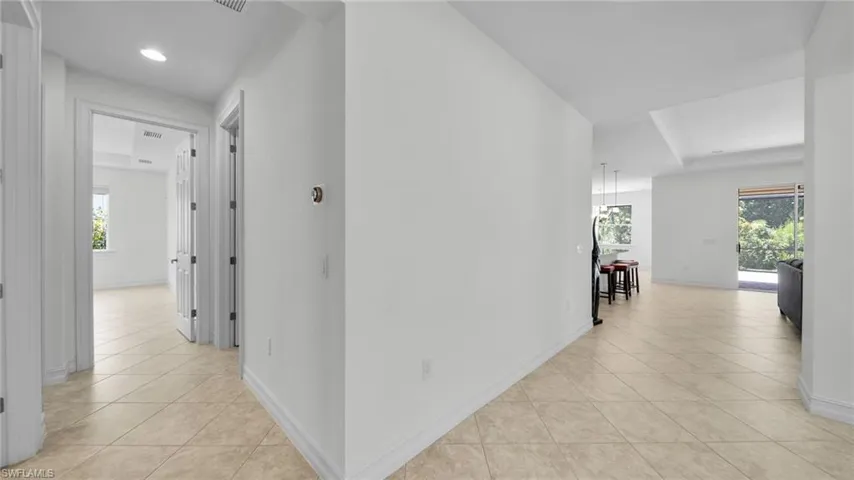 Hallway featuring access to garage, Mother N Law living space, Great room and Kitchen