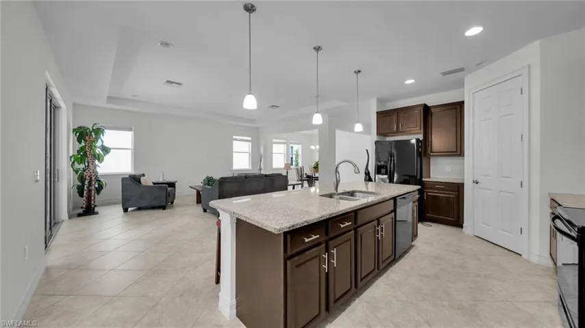 Gourmet Kitchen featuring top of the line appliances, granite counters, Big walk in Pantry ~ Great Room