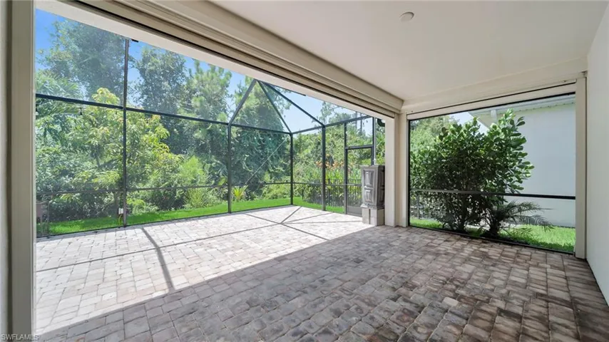 Paver lanai with electric cloth shutters