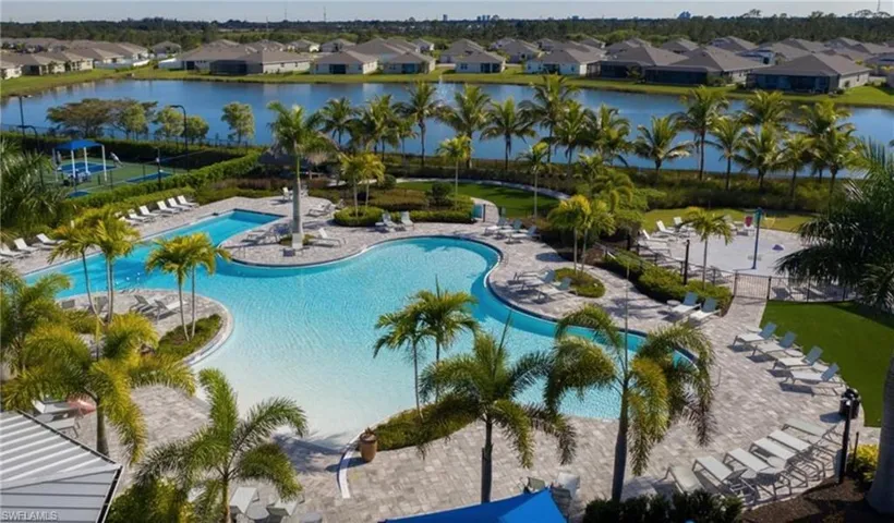 Community pool with a Lake view