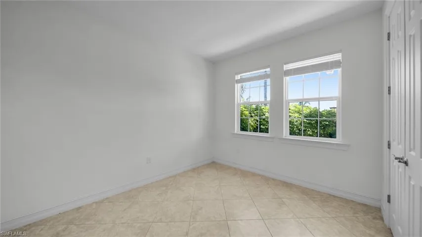 First Guest bedroom nearest front door with jack N Jill Bathroom
