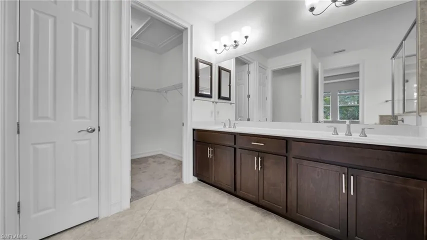 Master Bathroom with double vanity, tile floors, Huge walk in closet, Toilet closet
