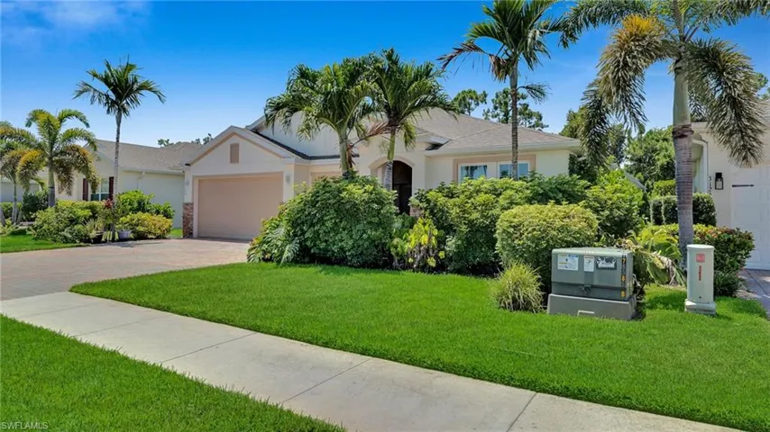 Front side view with manicured lawn, Underground utilities, sidewalks