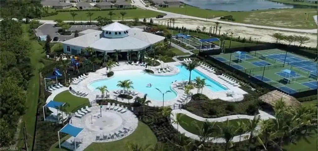 Aerial view of a Pool area, Clubhouse, Tennis Courts