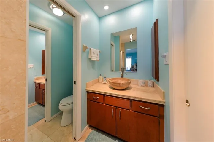 En suite Bathroom featuring dual vanities