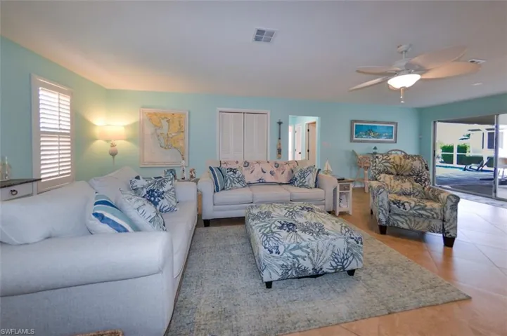Family room with dinette area and sliders to the lanai