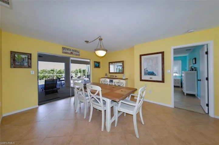 View of dining room with sliders to the lanai