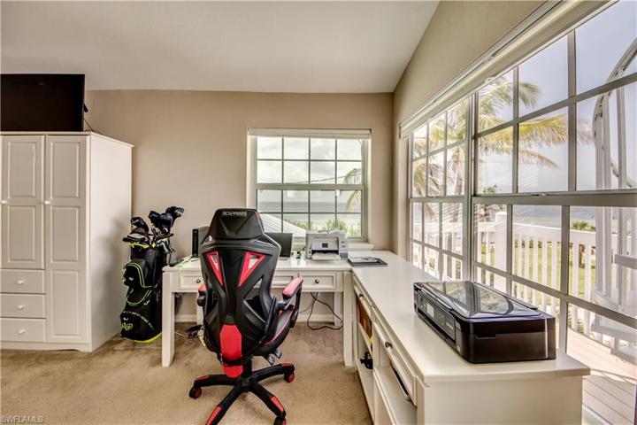 The Master Bedroom is large enough to accommodate an office workspace overlooking Charlotte Harbor