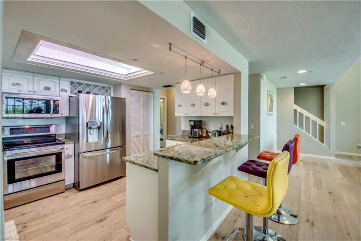 Kitchen with large pantry to the right of the refrigerator