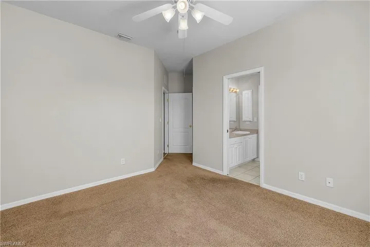 Bedroom featuring  ceiling fan, and Jack & Jill bathroom