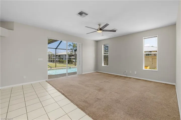 Family room off from Kitchen with Sliders to Pool &  plenty of natural light