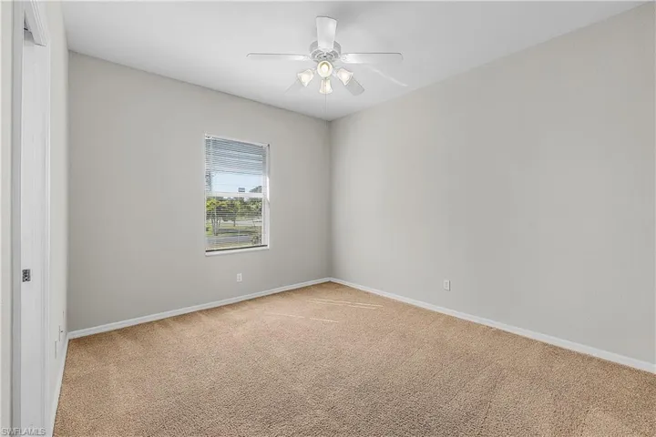 BONUS room with ceiling fan.
