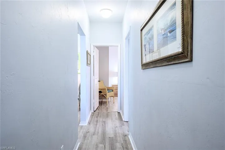 Hall featuring light hardwood / wood-style floors