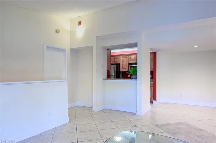 Living room looking into kitchen