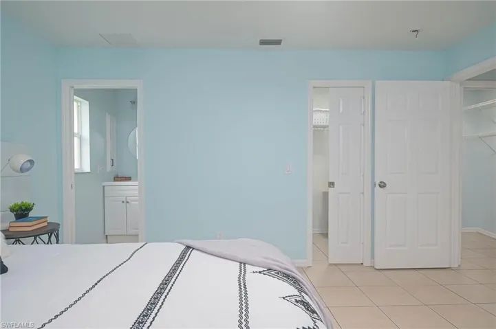 Primary-bedroom walk in closet
