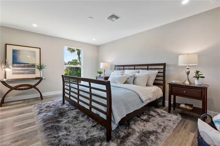 Bedroom featuring wood-type flooring