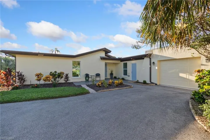 Ranch-style house with a garage