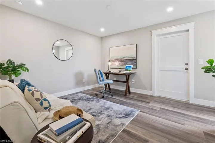 Office space with light wood-type flooring
