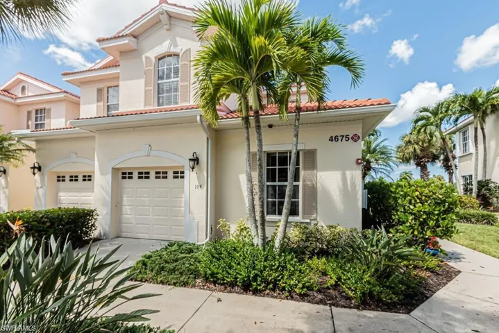 Mediterranean / spanish-style house featuring a garage
