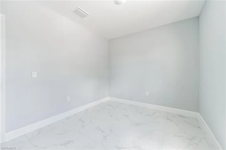 View of tiled empty room