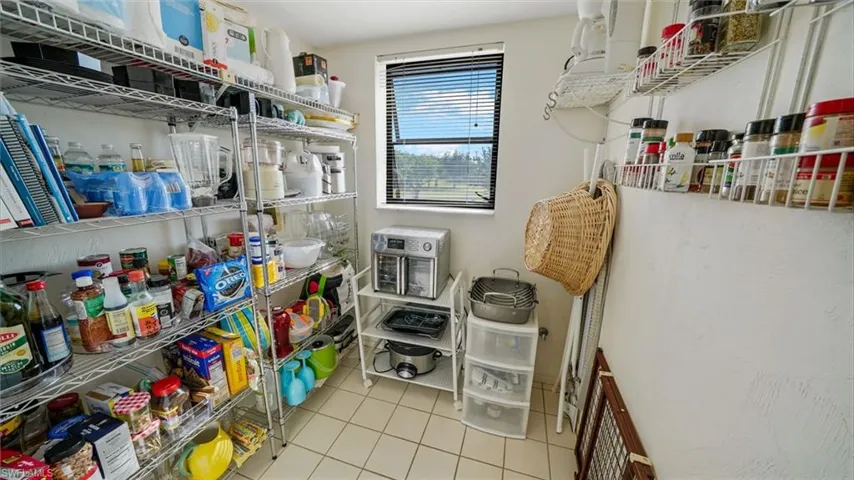 Elevator ready space, walk-in pantry, or convert to laundry with hookup already in place.
