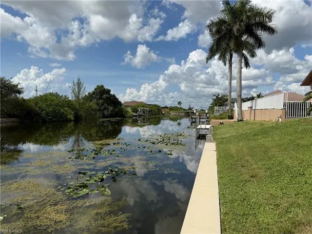 Fresh water canal, seawall, and yard