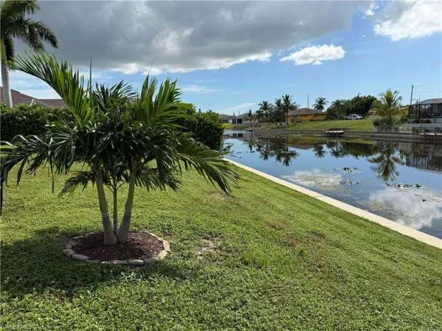 Fresh water canal, seawall, and yard