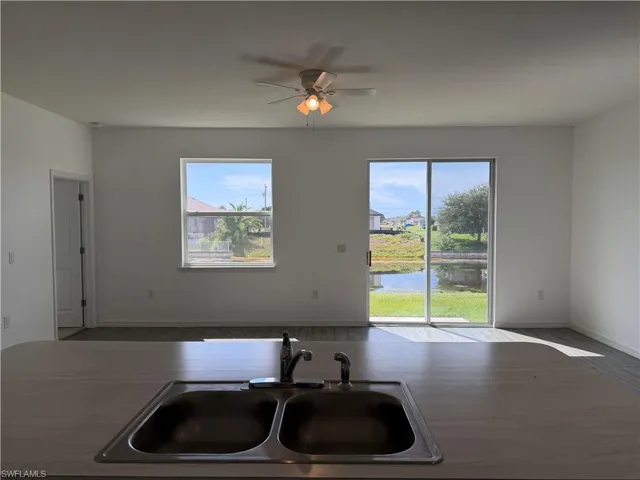 Kitchen view facing the backyard and canal