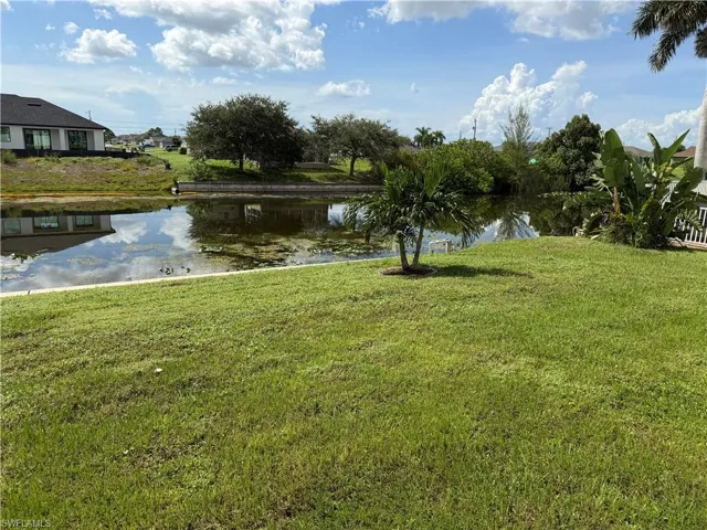 Fresh water canal, seawall, and yard