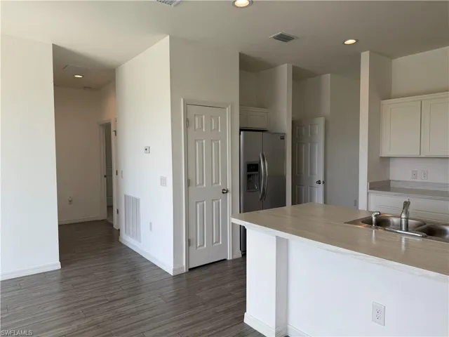 Kitchen and entrance towards guest bedrooms