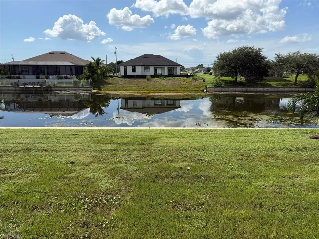 Fresh water canal, seawall, and yard