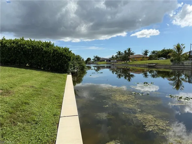 Fresh water canal, seawall, and yard