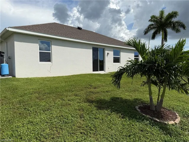 Back of the home and yard