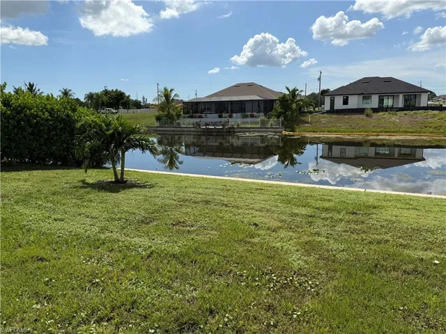 Fresh water canal, seawall, and yard