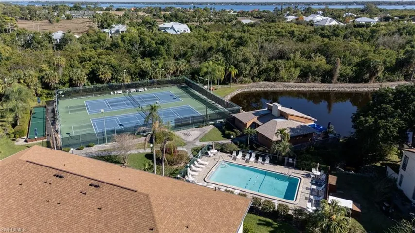 Aerial view of a large body of water and a pool