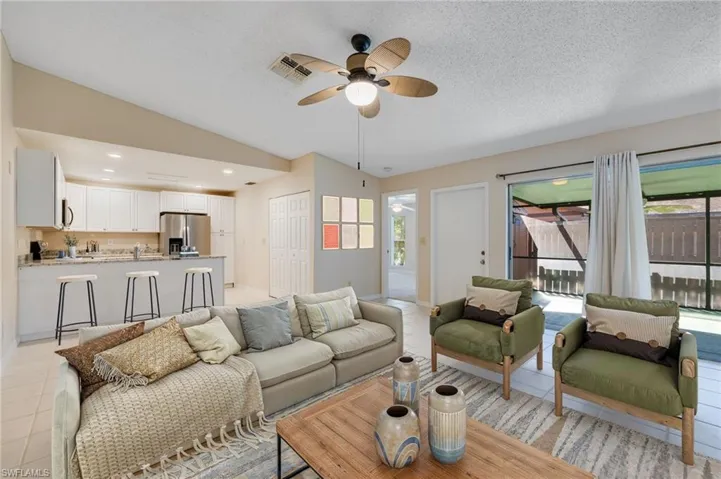 Virtually staged living room and kitchen counter