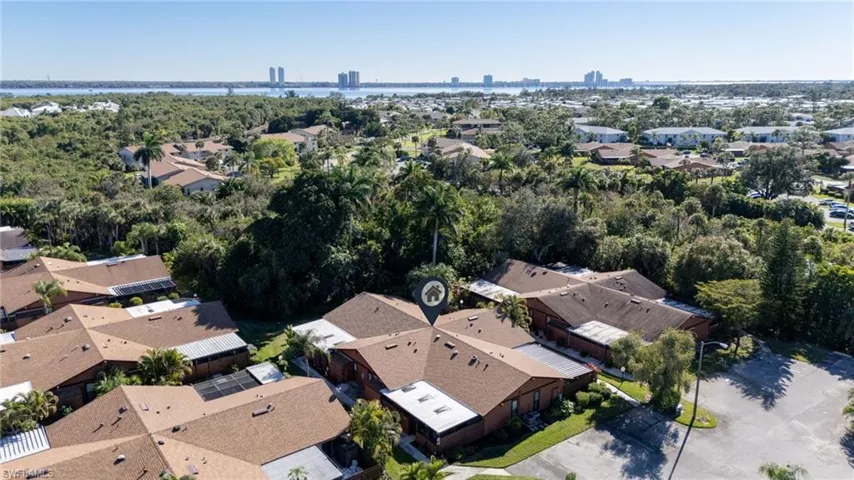 Aerial view of property and surrounding area with nearby suburban area and nearby urban area