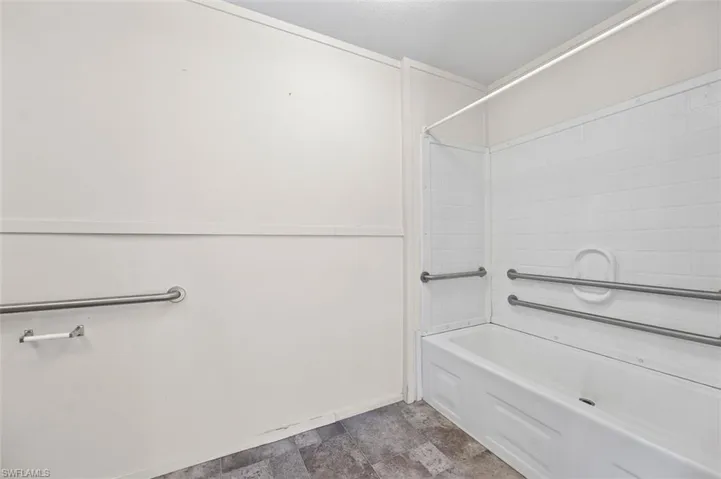 Bathroom featuring shower / bathing tub combination
