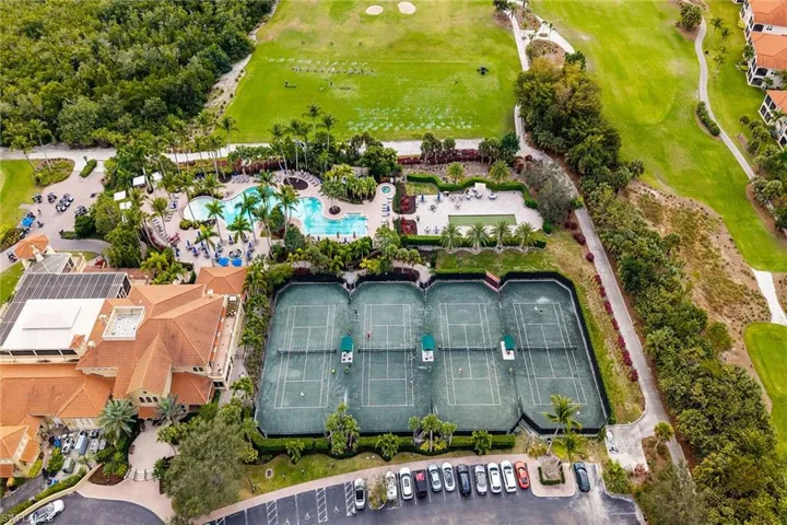 Aerial view of a golf course and a pool