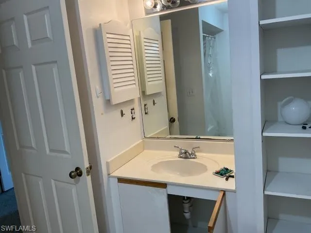 Full bathroom featuring vanity
